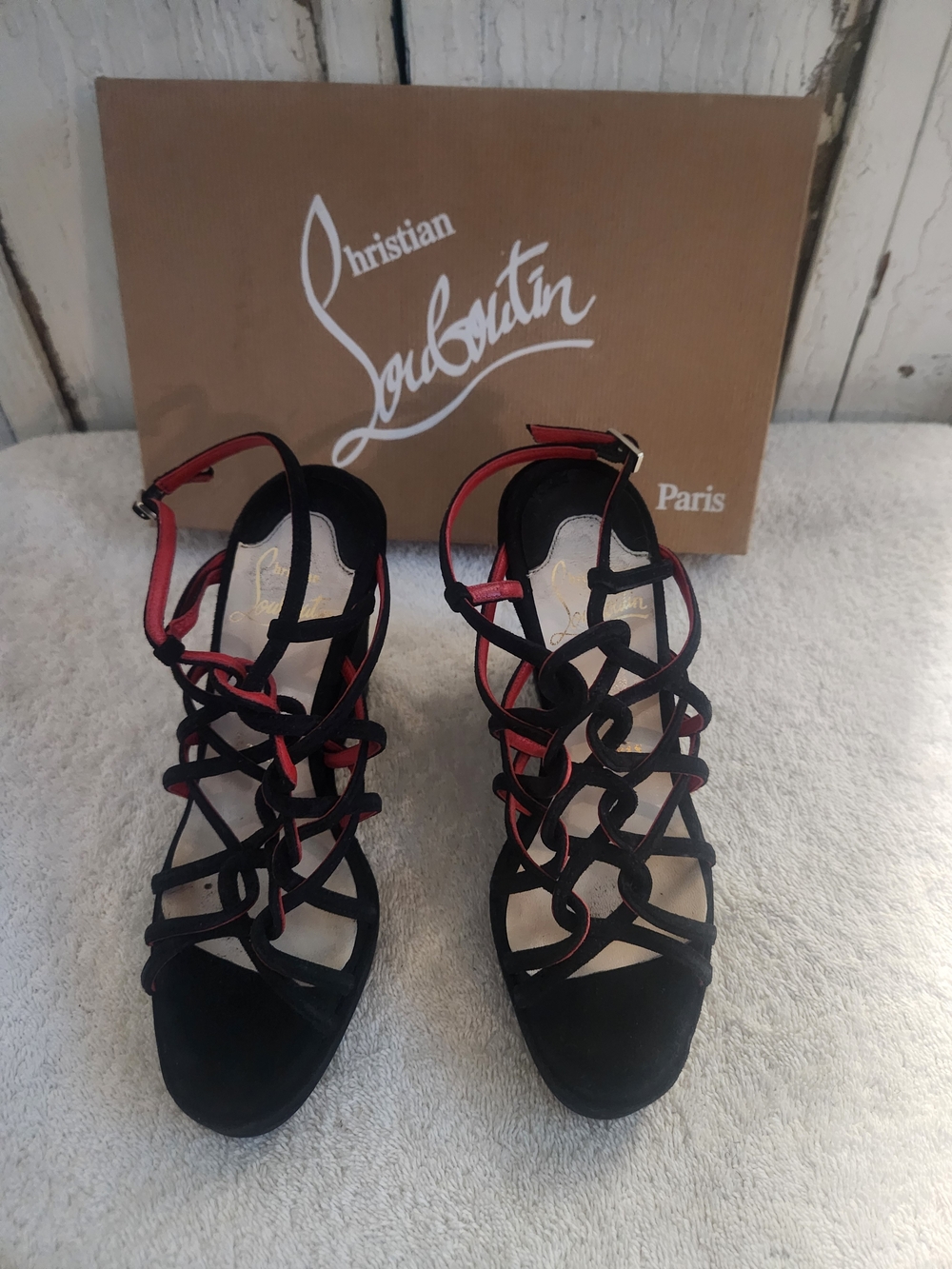 Christian Louboutin Black and Red Strappy Lace-Up Wedge Heels.